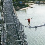 TRAVESSIA HISTÓRICA: MANEZINHO RAFAEL BRIDI TENTA NOVO RECORDE MUNDIAL NA PONTE HERCÍLIO LUZ EM FLORIANÓPOLIS